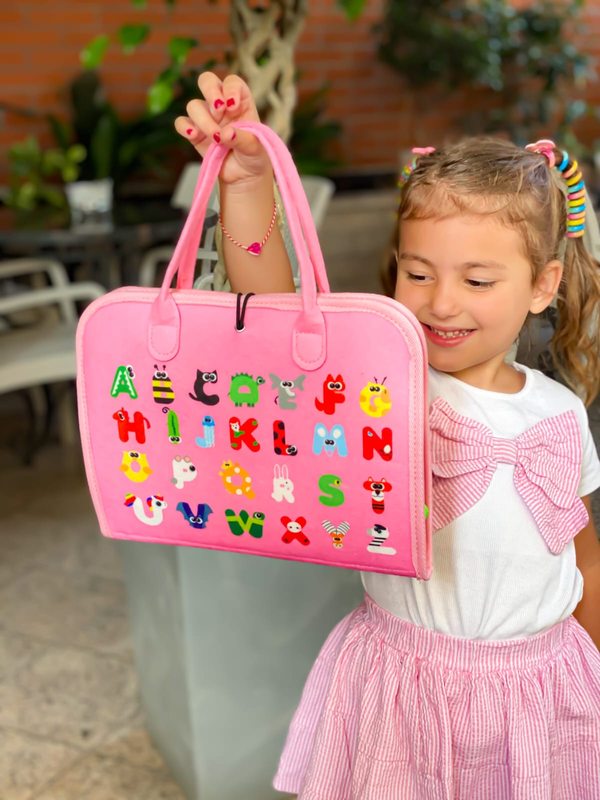 Busy Board Montessori rozë, çantë me aktivitete për fëmijë